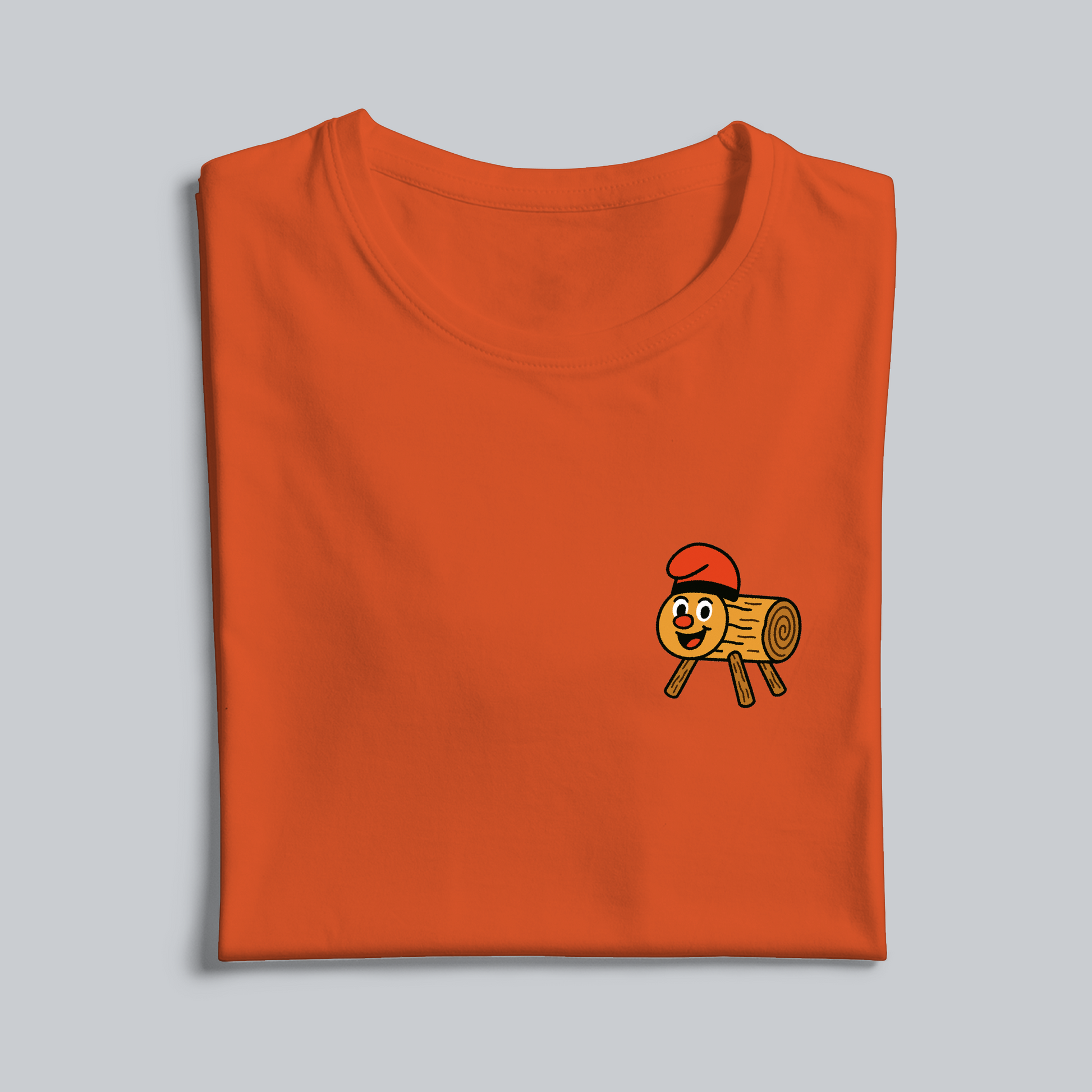 Orange t-shirt with the Caga Tio